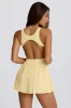 Soft Active Open-Back Pleated Tennis Dress in Lemon sold by Oh Polly