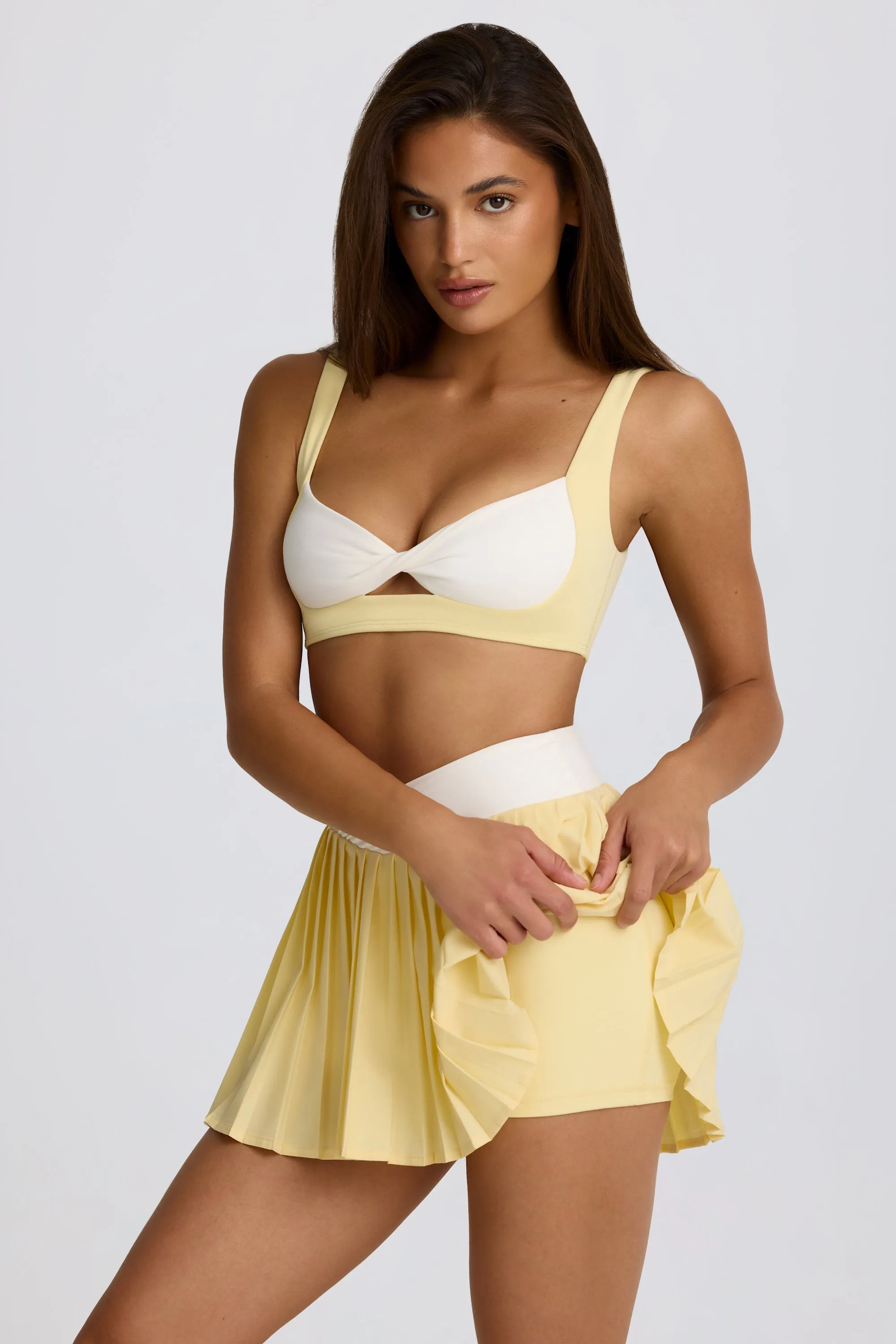 Soft Active Crossover Pleated Mini Skort in Lemon sold by Oh Polly product image thumbnail 4