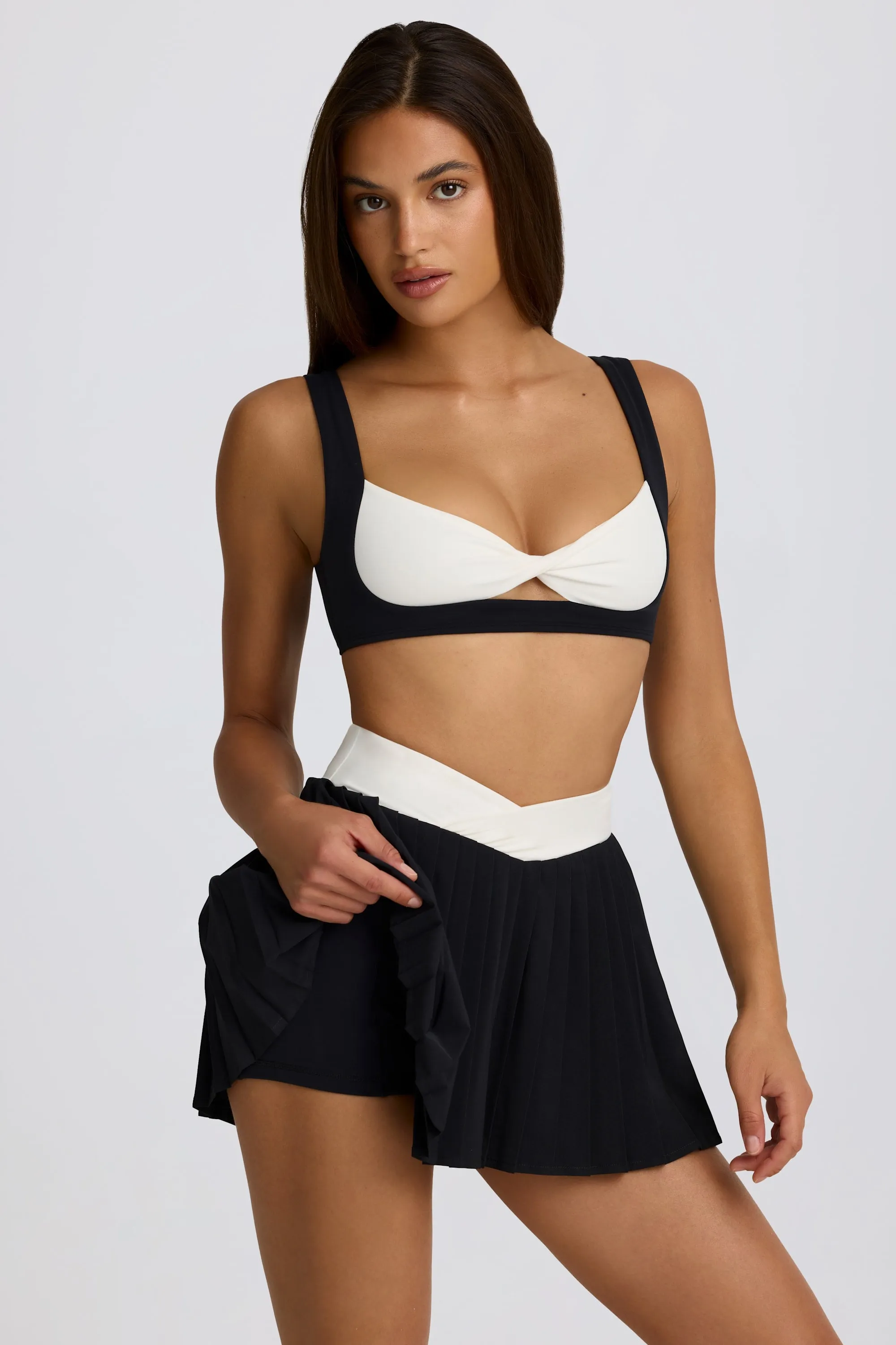 Soft Active Crossover Pleated Mini Skort in Black sold by Oh Polly product image thumbnail 4