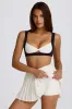 Soft Active Crossover Pleated Mini Skort in Ivory sold by Oh Polly