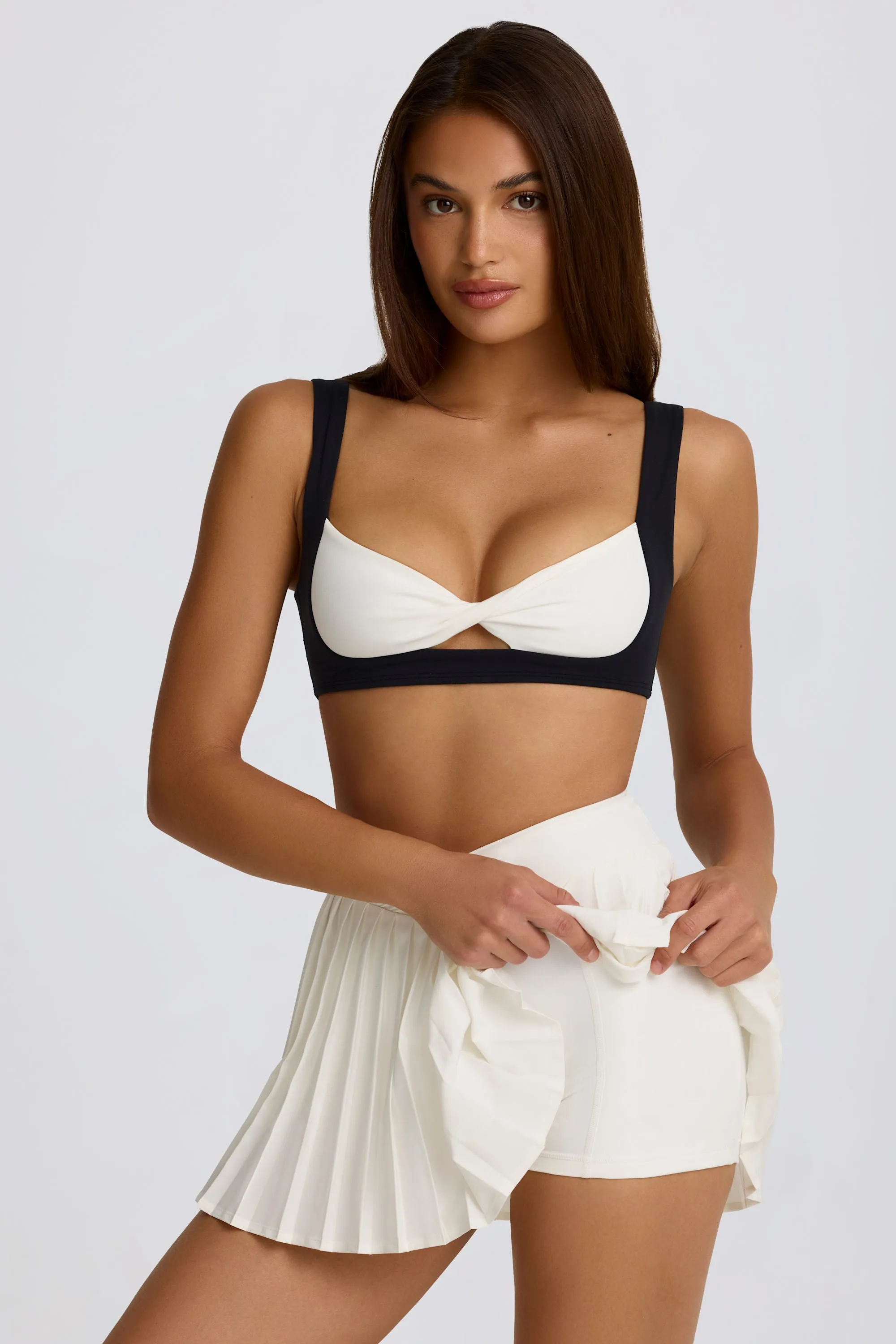 Soft Active Crossover Pleated Mini Skort in Ivory sold by Oh Polly product image thumbnail 5