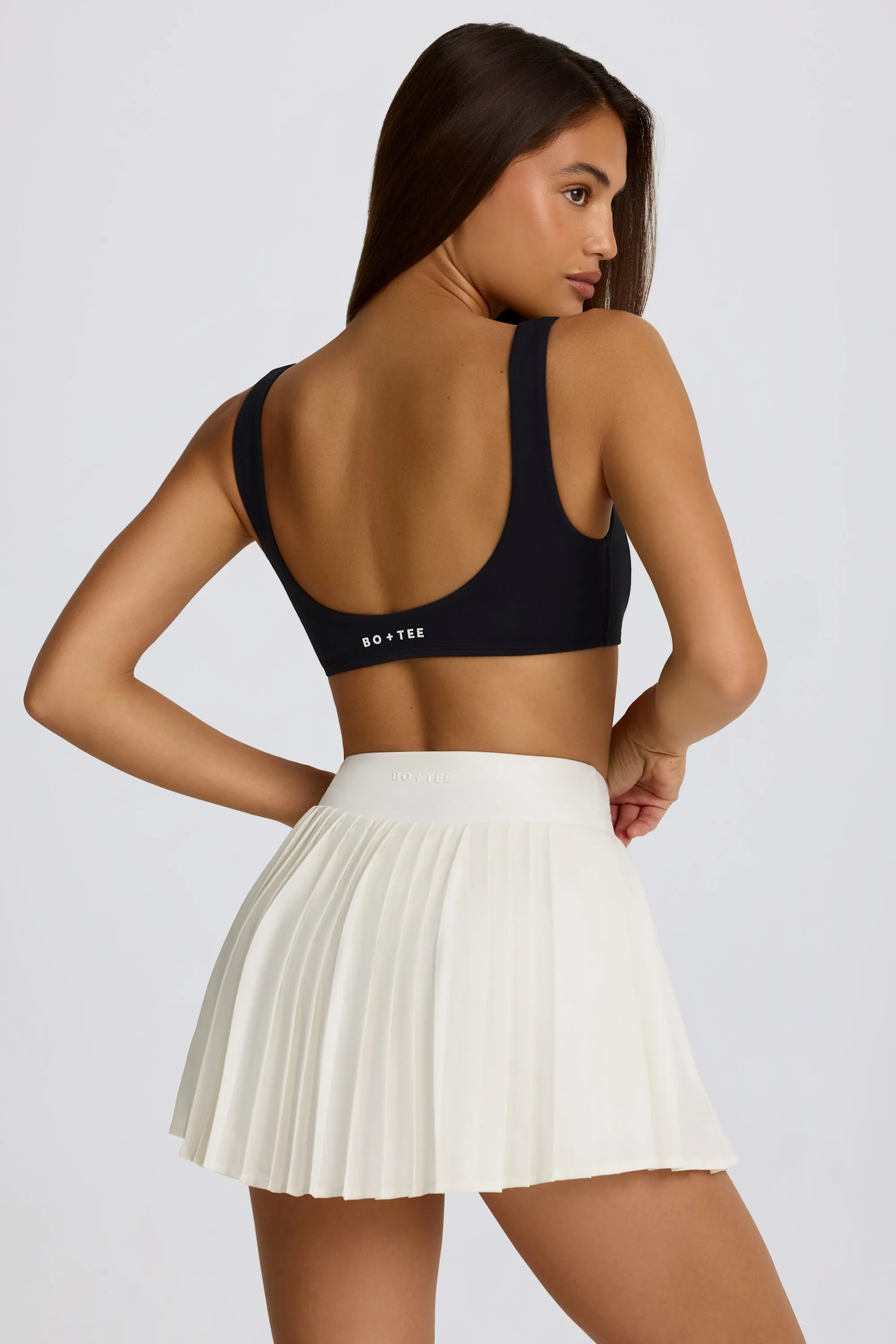 Soft Active Crossover Pleated Mini Skort in Ivory sold by Oh Polly product image thumbnail 2
