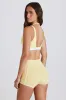 Soft Active Contrast Mini Shorts in Lemon sold by Oh Polly