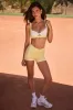 Soft Active Contrast Mini Shorts in Lemon sold by Oh Polly