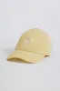 Baseball Cap in Lemon sold by Oh Polly