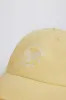 Baseball Cap in Lemon sold by Oh Polly