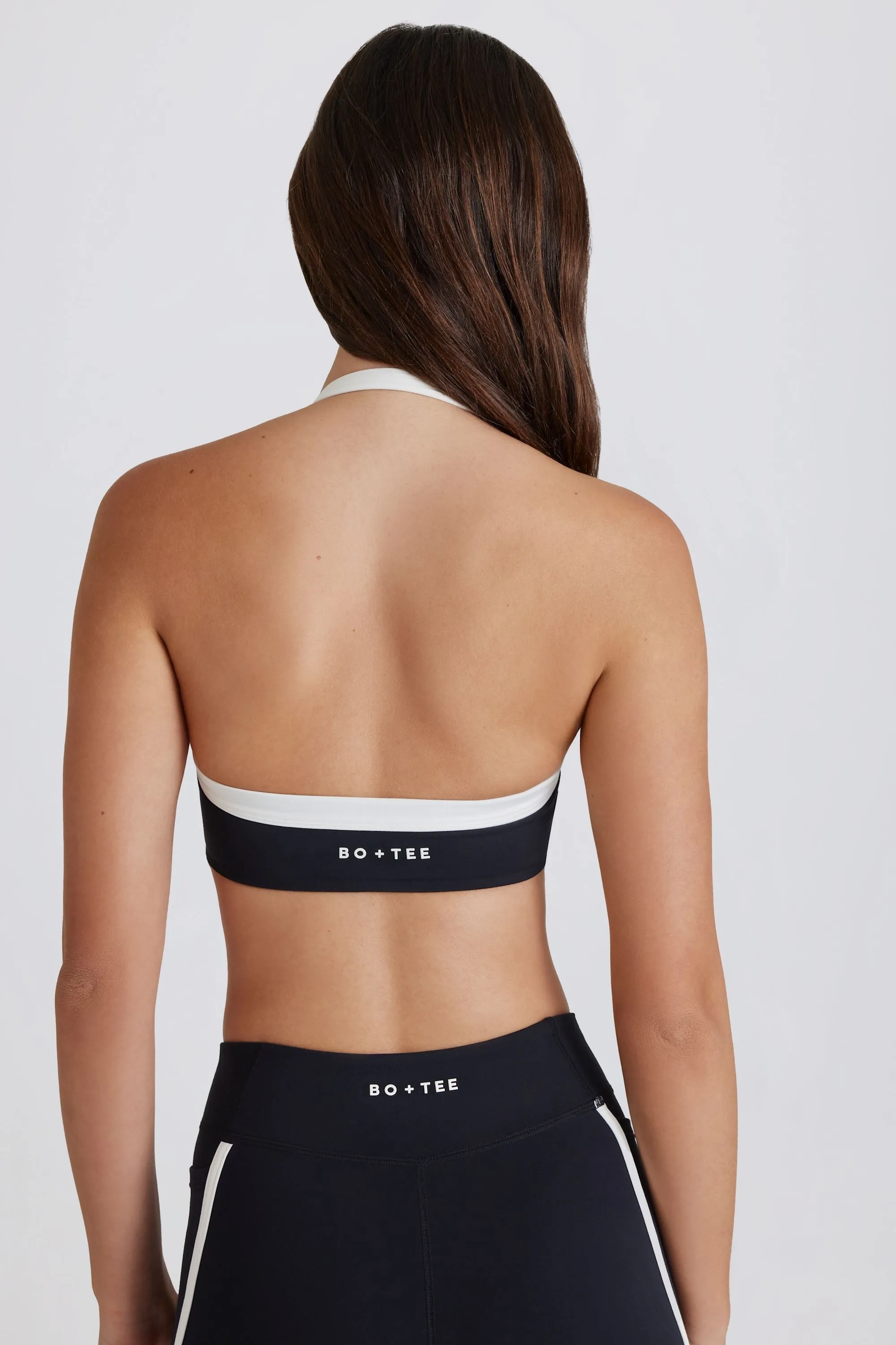 Soft Active Twist-Front Halterneck Sports Bra in Black sold by Oh Polly product image thumbnail 2