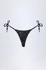 Side-Tie Bead Thong Bikini Bottoms in Black Leopard Hotfix sold by Oh Polly