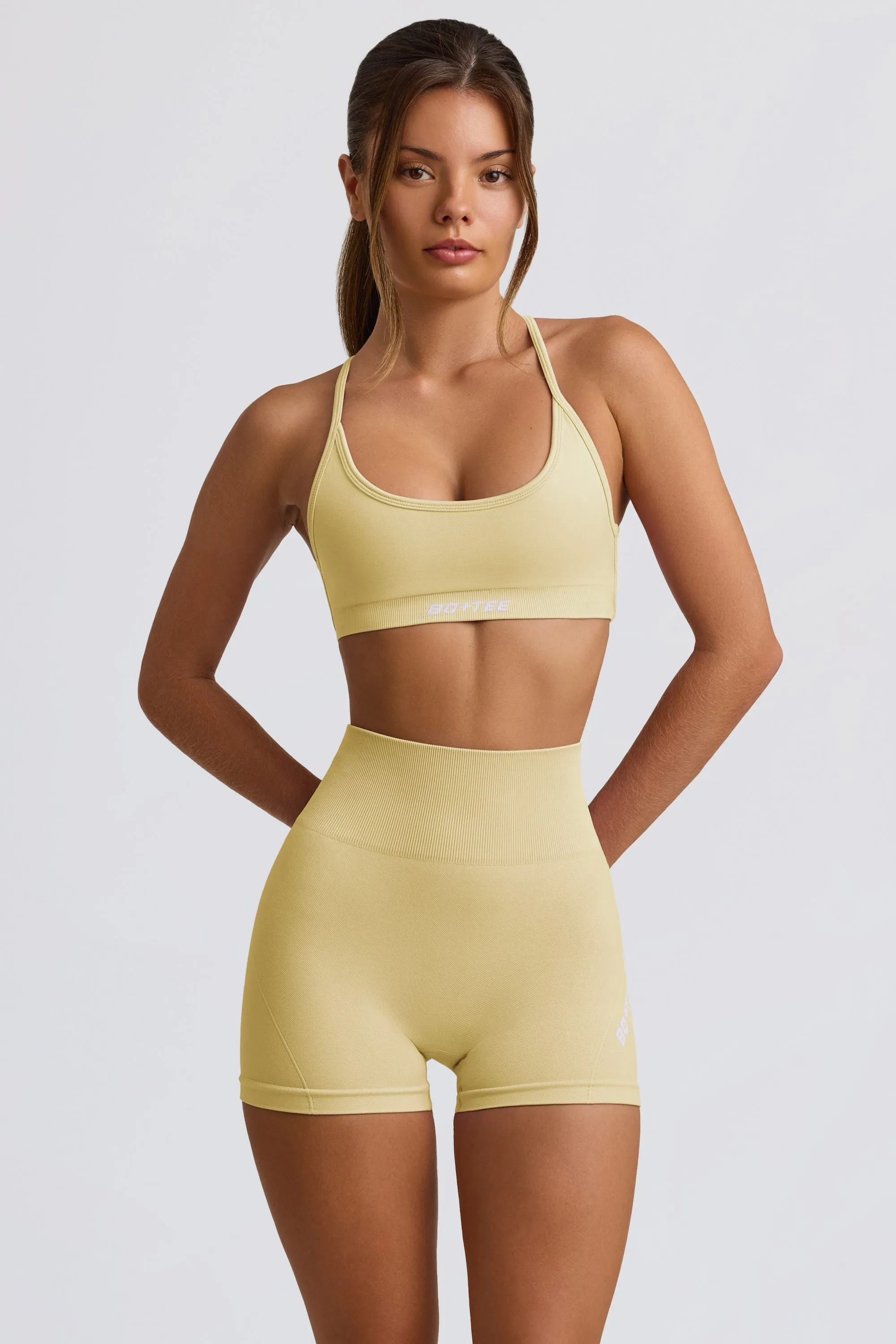 Super Sculpt Seamless Mini Shorts in Butter Yellow sold by Oh Polly