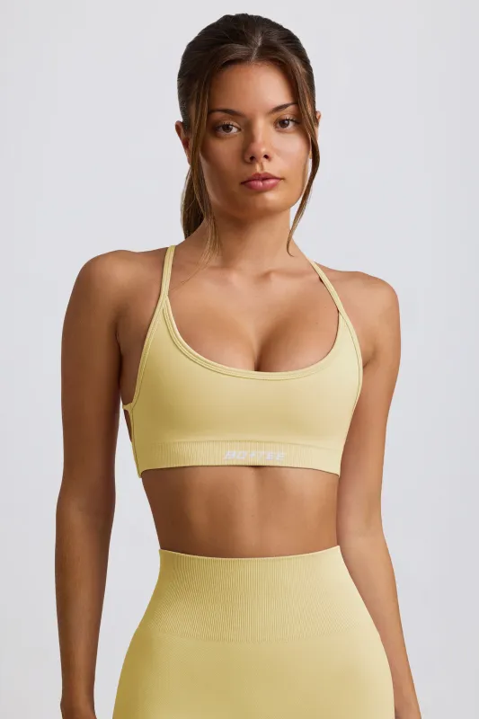 Super Sculpt Seamless Backless Sports Bra in Butter Yellow sold by Oh Polly