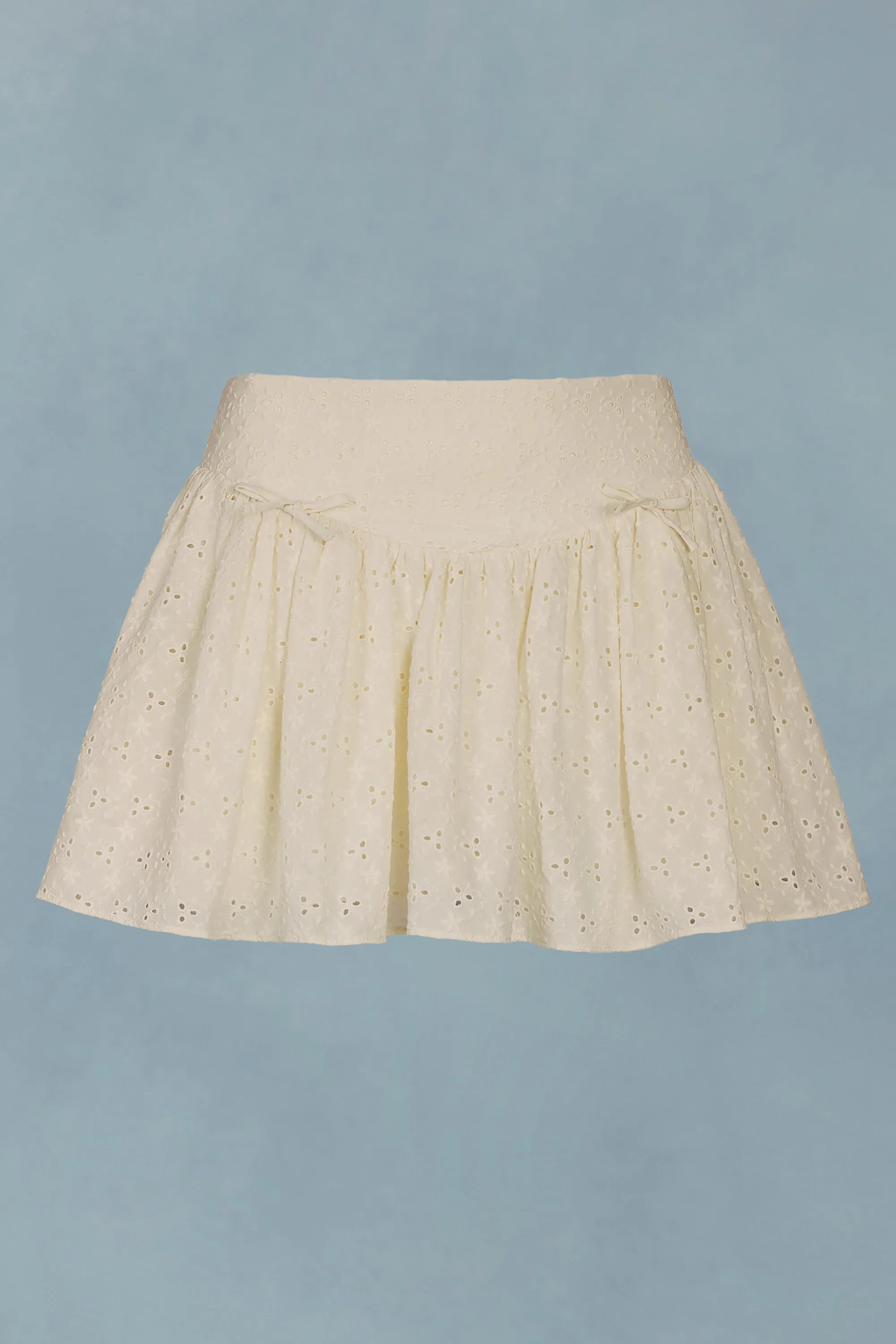 Bow-Detail Broderie Anglaise Mini Skirt in Ivory sold by Oh Polly