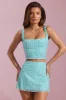 Embellished Low-Rise Mini Skirt in Aqua Blue sold by Oh Polly