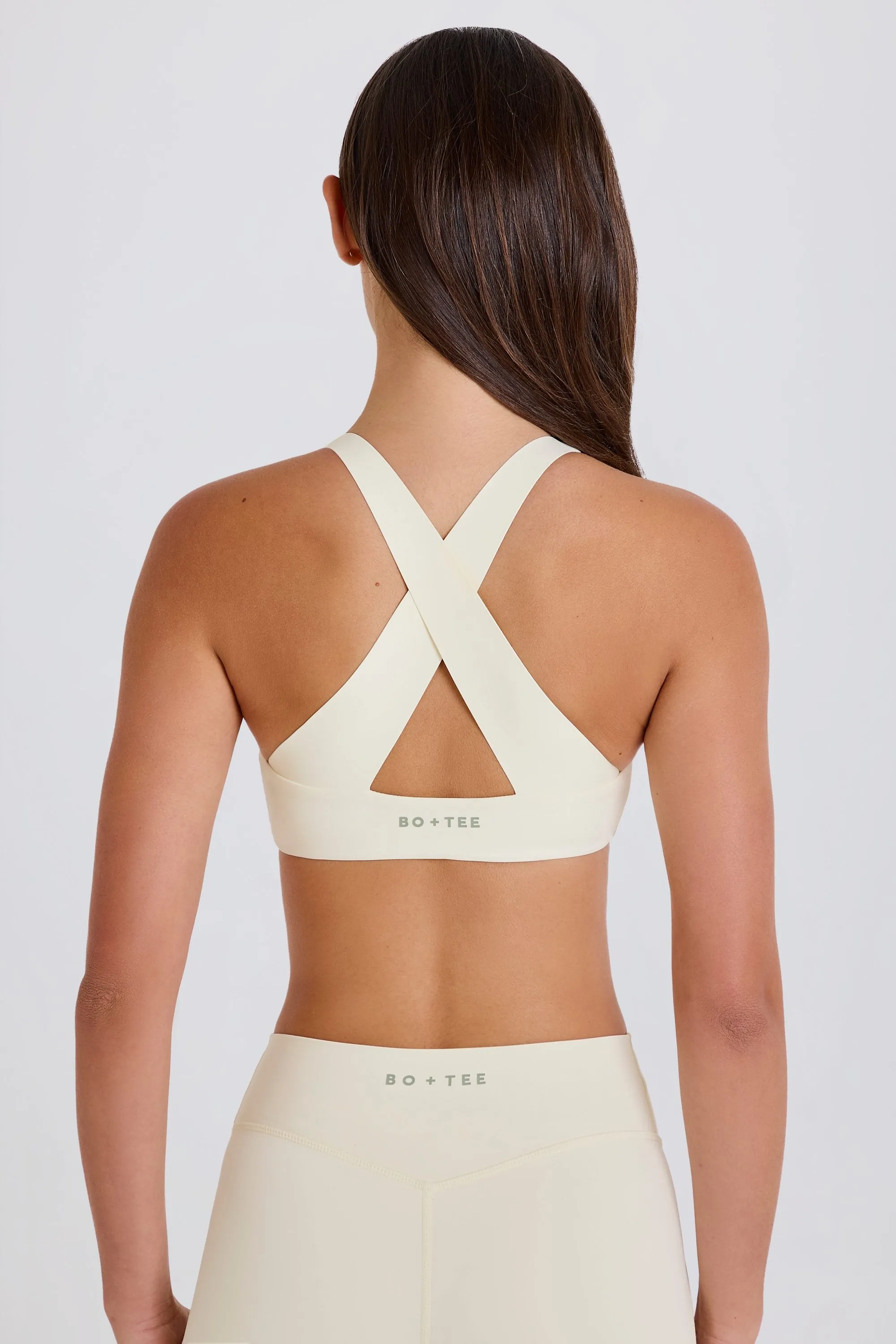Crossback V-Neck Sports Bra in Cream sold by Oh Polly product image thumbnail 4