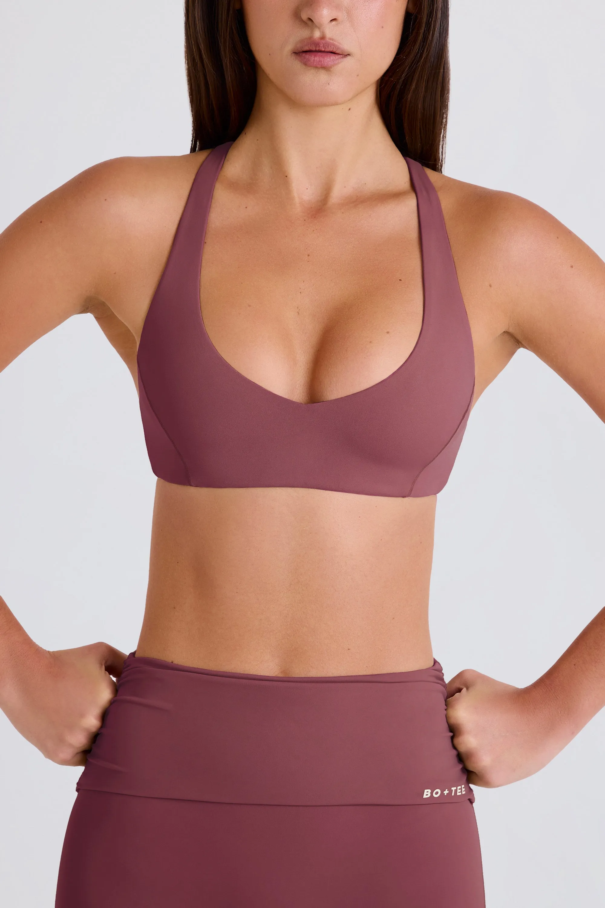 Four-Way Stretch Crossback V-Neck Sports Bra in Acai sold by Oh Polly product image thumbnail 5