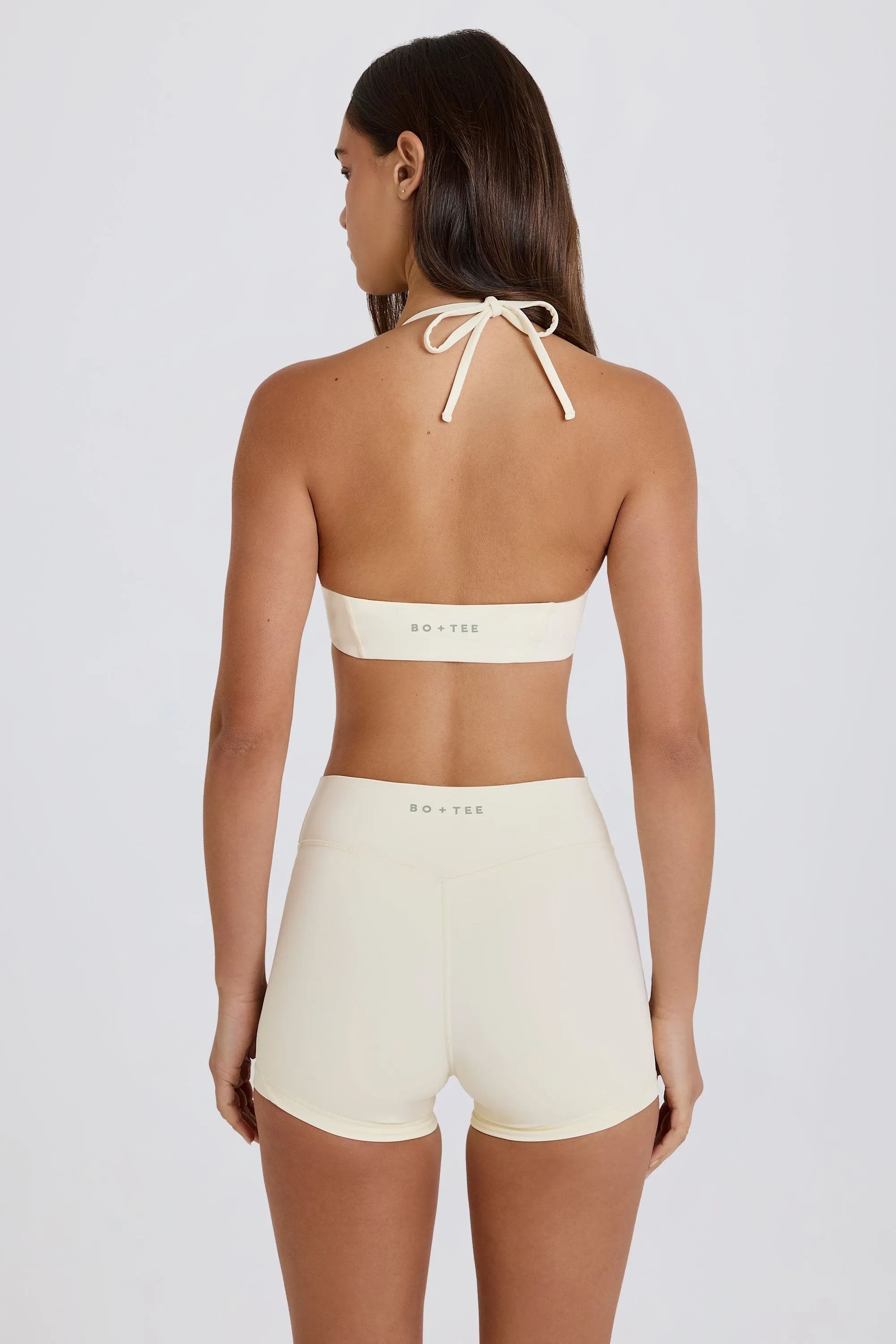 Four-Way Stretch High-Waist Mini Shorts in Cream sold by Oh Polly product image thumbnail 4
