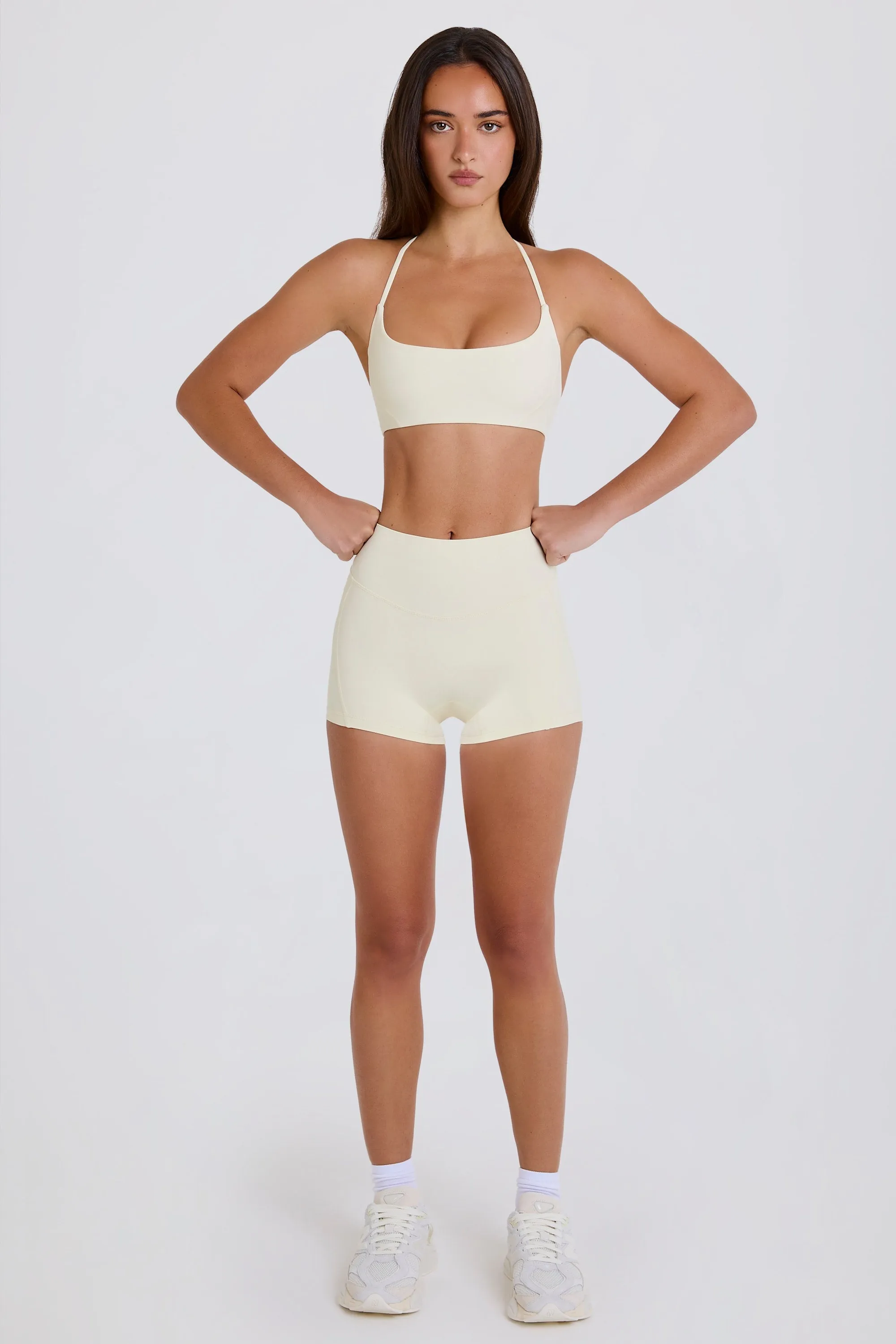 Four-Way Stretch High-Waist Mini Shorts in Cream sold by Oh Polly product image thumbnail 2