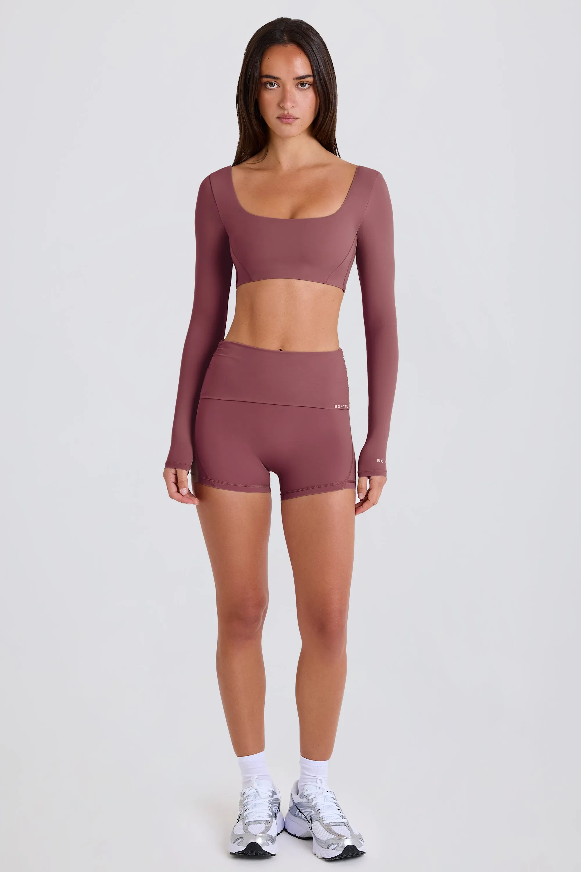 Four-Way Stretch Foldover Mid-Rise Mini Shorts in Acai sold by Oh Polly product image thumbnail 5
