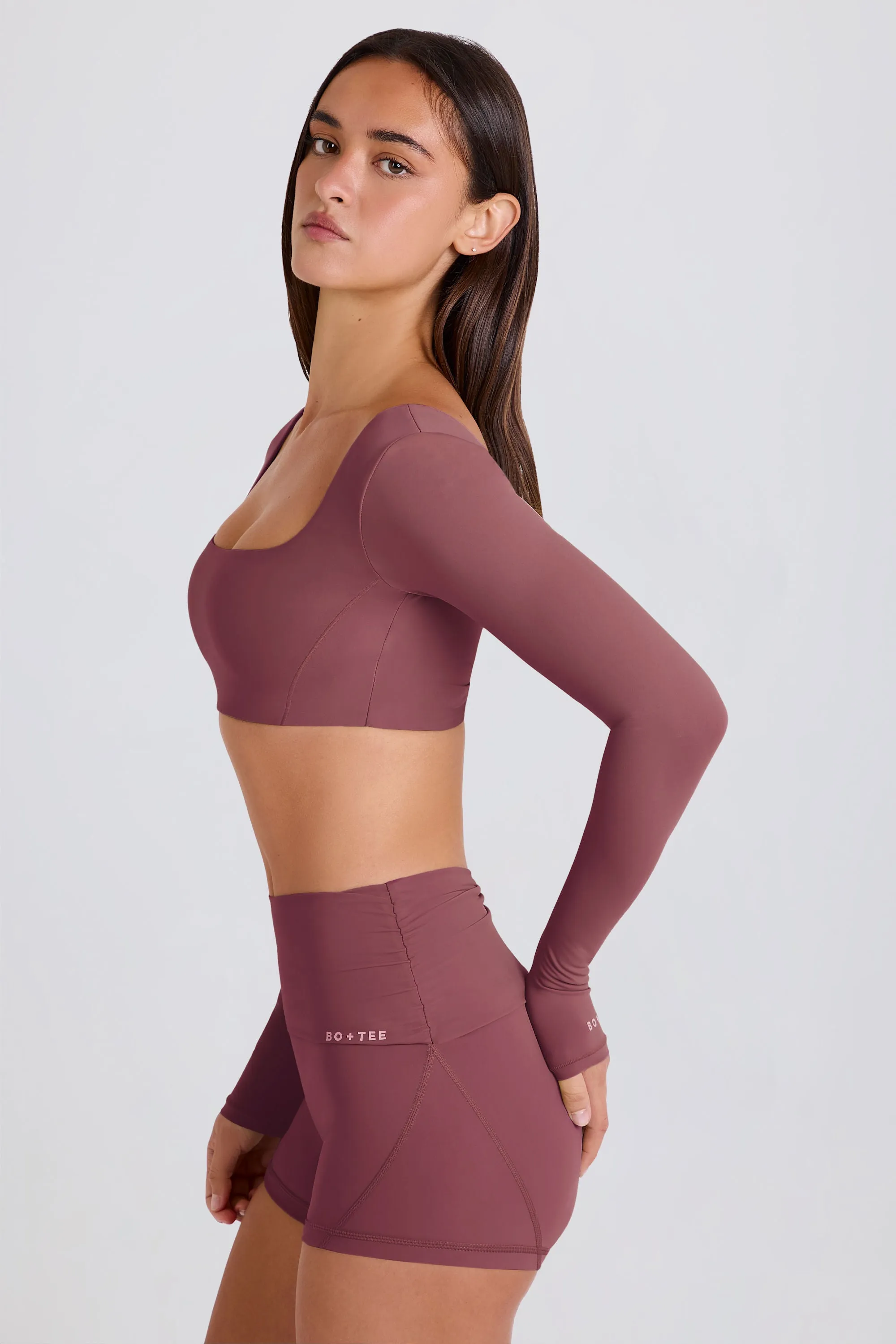 Four-Way Stretch Foldover Mid-Rise Mini Shorts in Acai sold by Oh Polly product image thumbnail 3