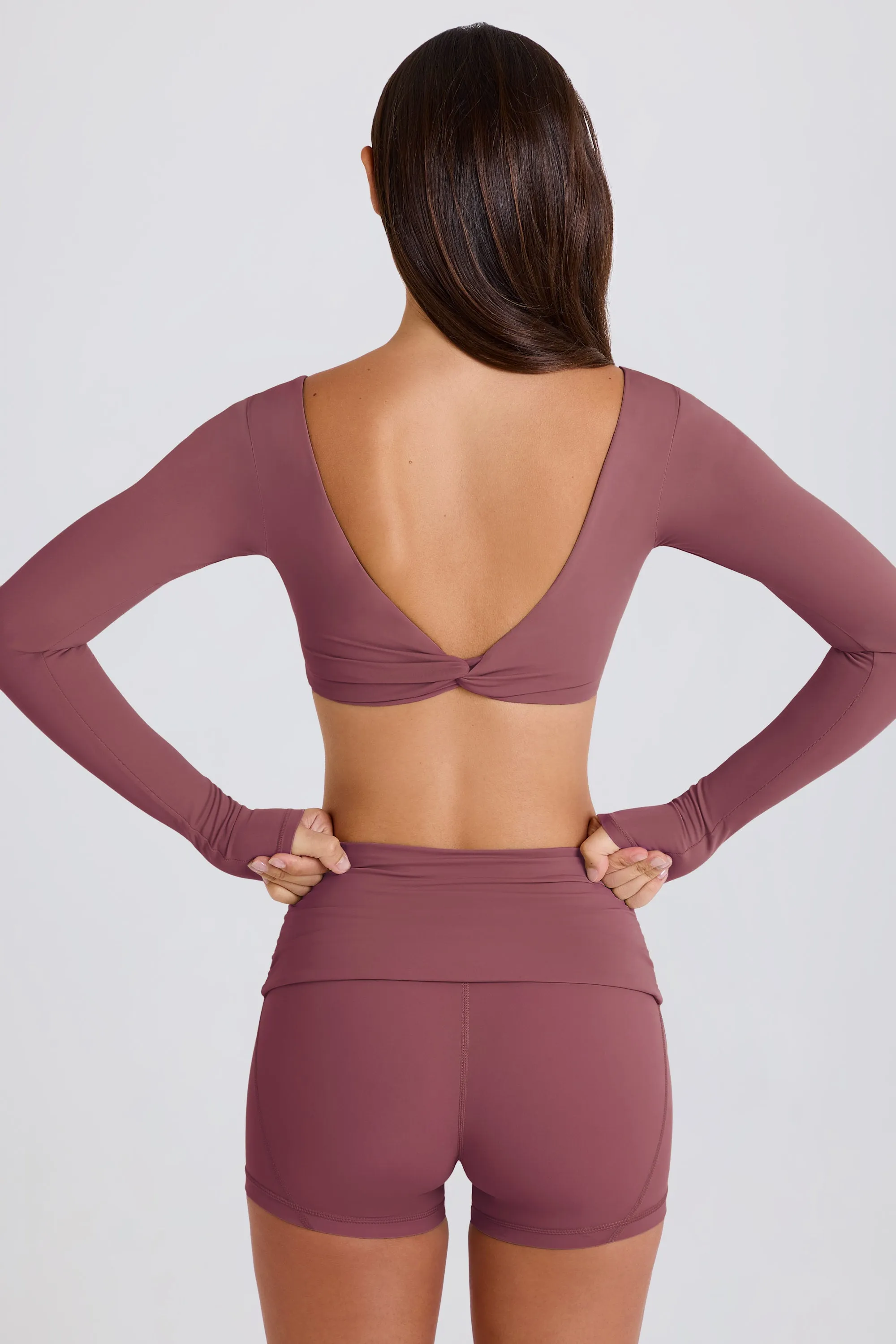 Four-Way Stretch Foldover Mid-Rise Mini Shorts in Acai sold by Oh Polly product image thumbnail 4