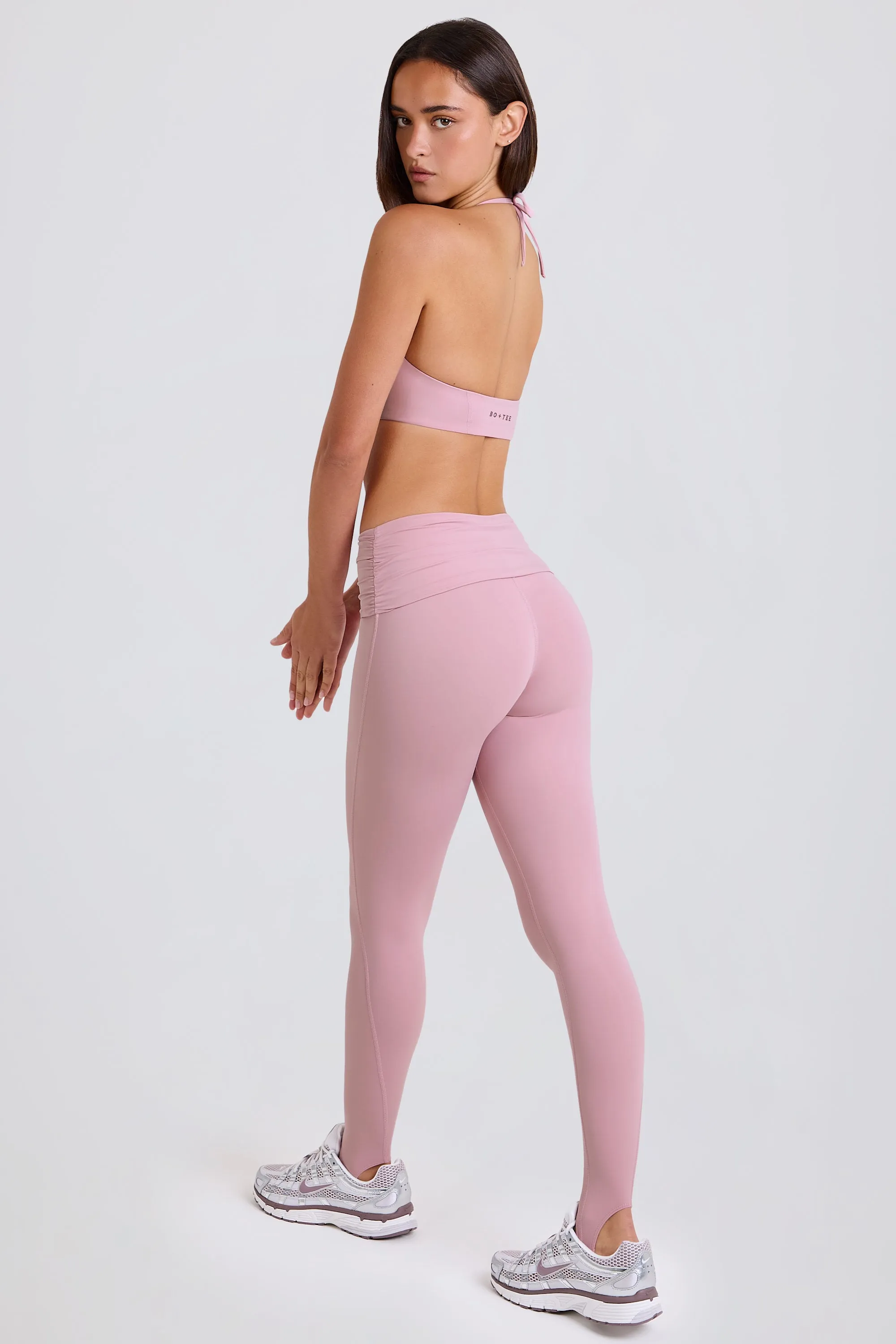 Four-Way Stretch Foldover Mid-Rise Stirrup Leggings in Mauve sold by Oh Polly product image thumbnail 2