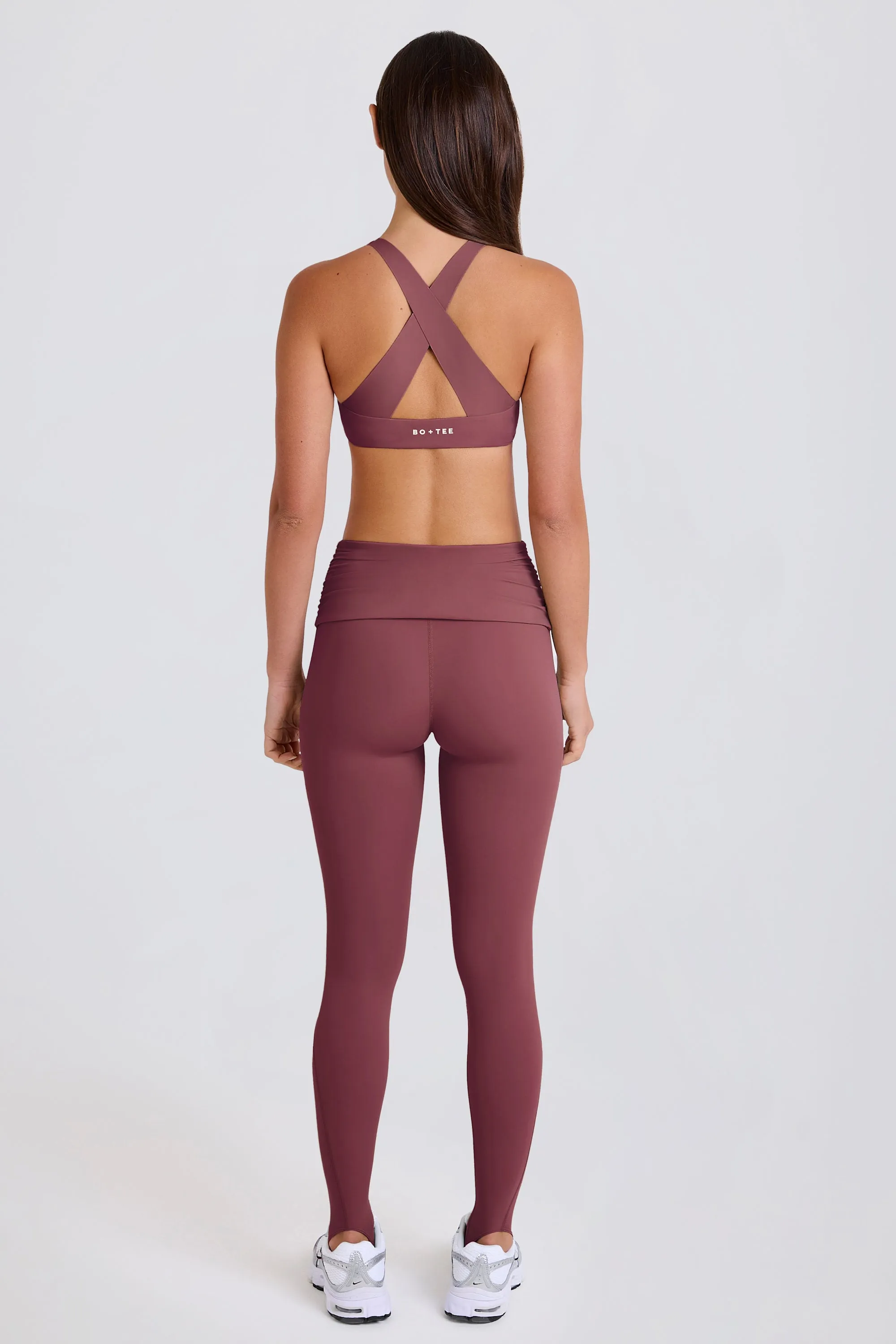 Four-Way Stretch Foldover Mid-Rise Stirrup Leggings in Acai sold by Oh Polly product image thumbnail 4