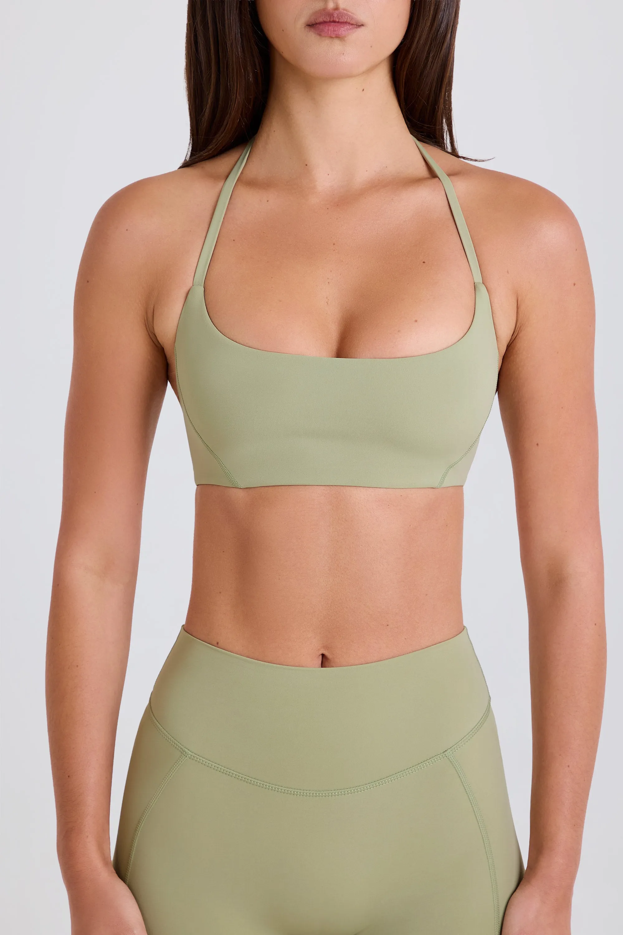 Four-Way Stretch Scoop-Neck Halterneck Sports Bra in Matcha sold by Oh Polly product image thumbnail 5