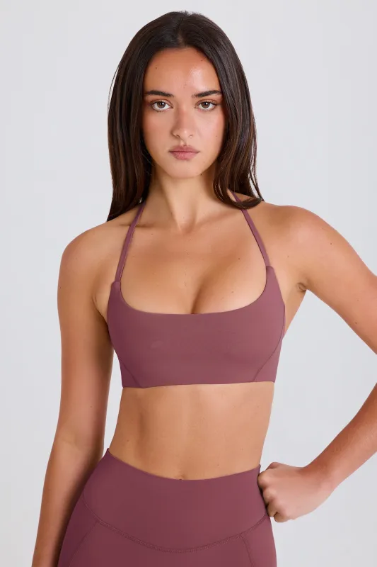 Scoop-Neck Halterneck Sports Bra in Acai sold by Oh Polly