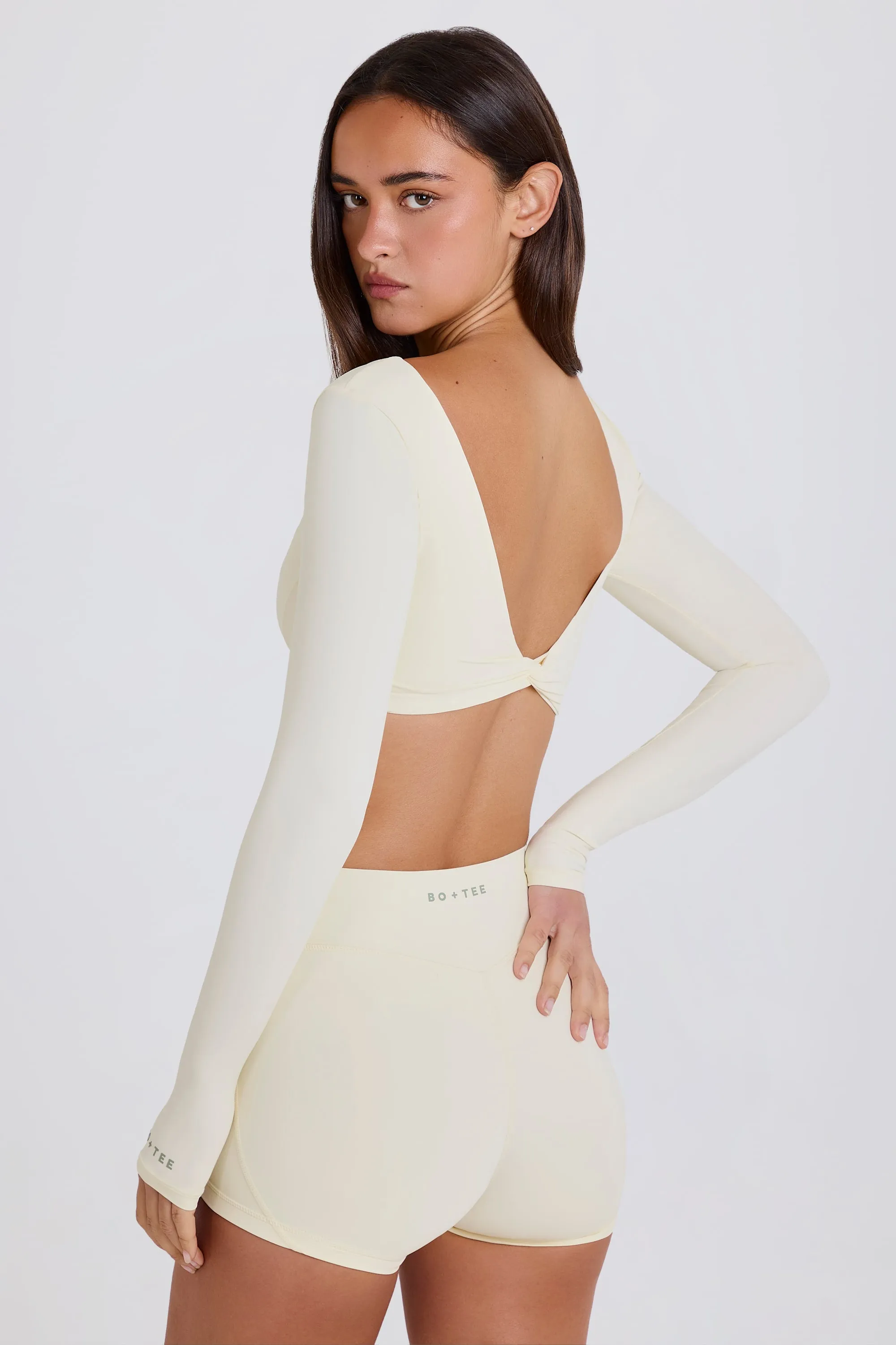 Four-Way Stretch Multiway Long-Sleeve Crop Top in Cream sold by Oh Polly product image thumbnail 2