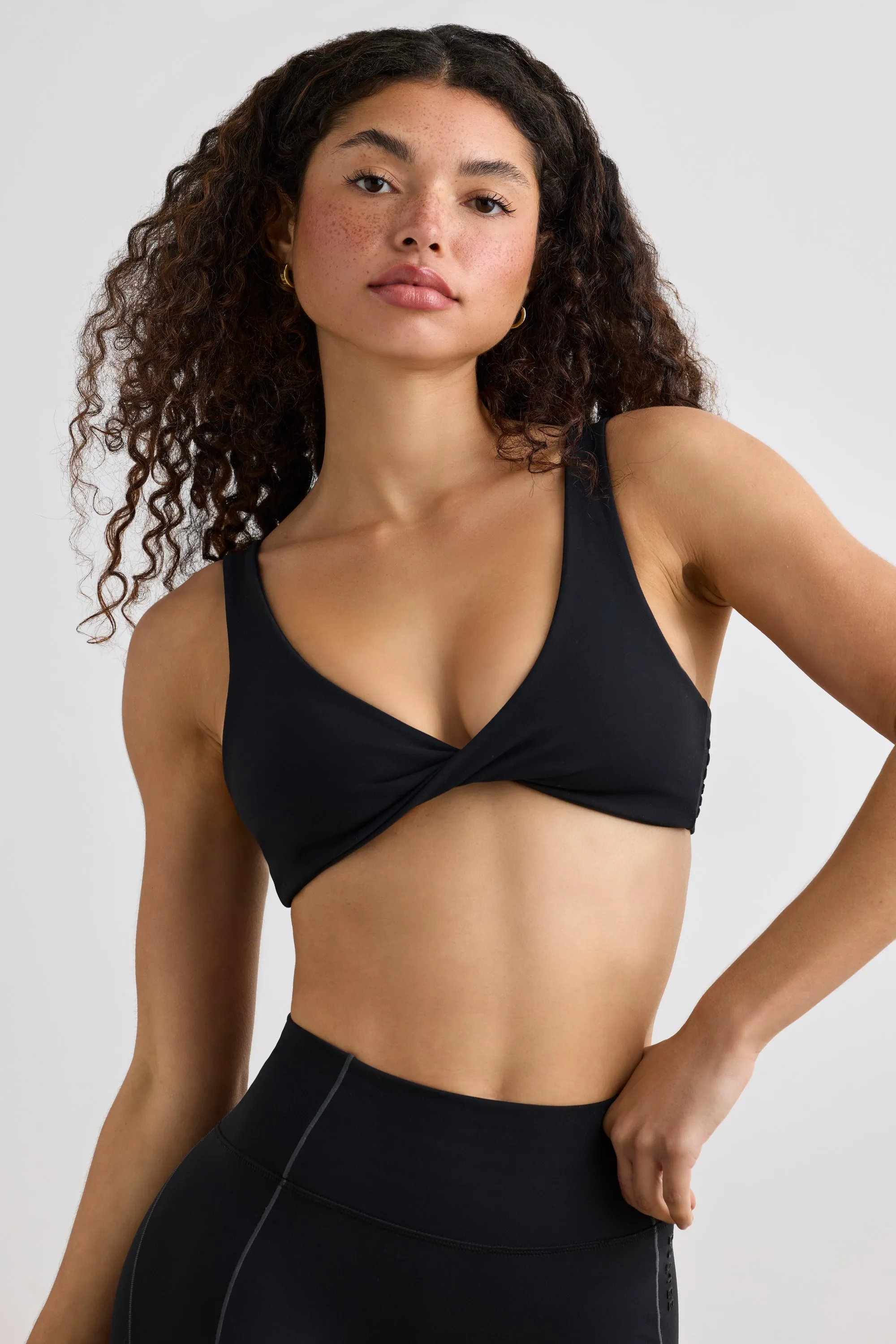 Soft Active V-Neck Sports Bra in Black sold by Oh Polly