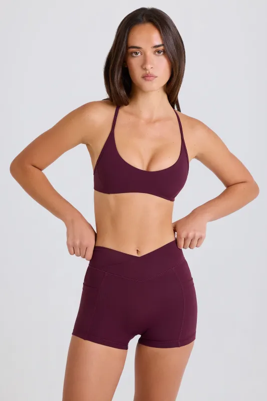 Soft Active V-Waist Pocket Mini Shorts in Burgundy sold by Oh Polly