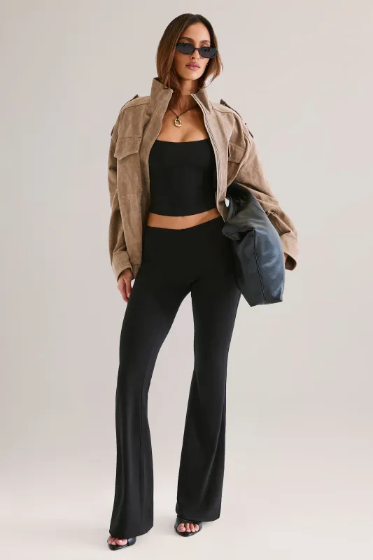 Modal Mid-Rise Flared Trousers in Black sold by Oh Polly