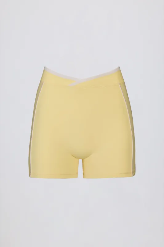 Soft Active Wrapover Contrast Mini Shorts in Soft Yellow sold by Oh Polly