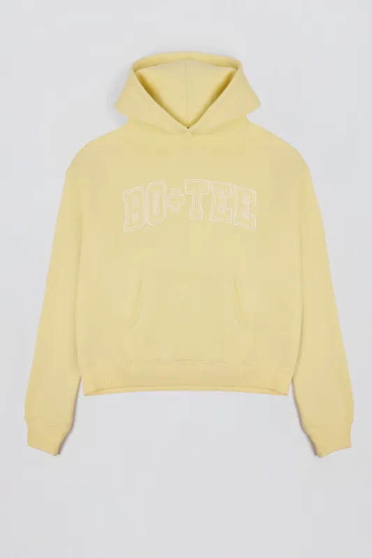 Oversized Appliqué Hoodie in Soft Yellow sold by Oh Polly