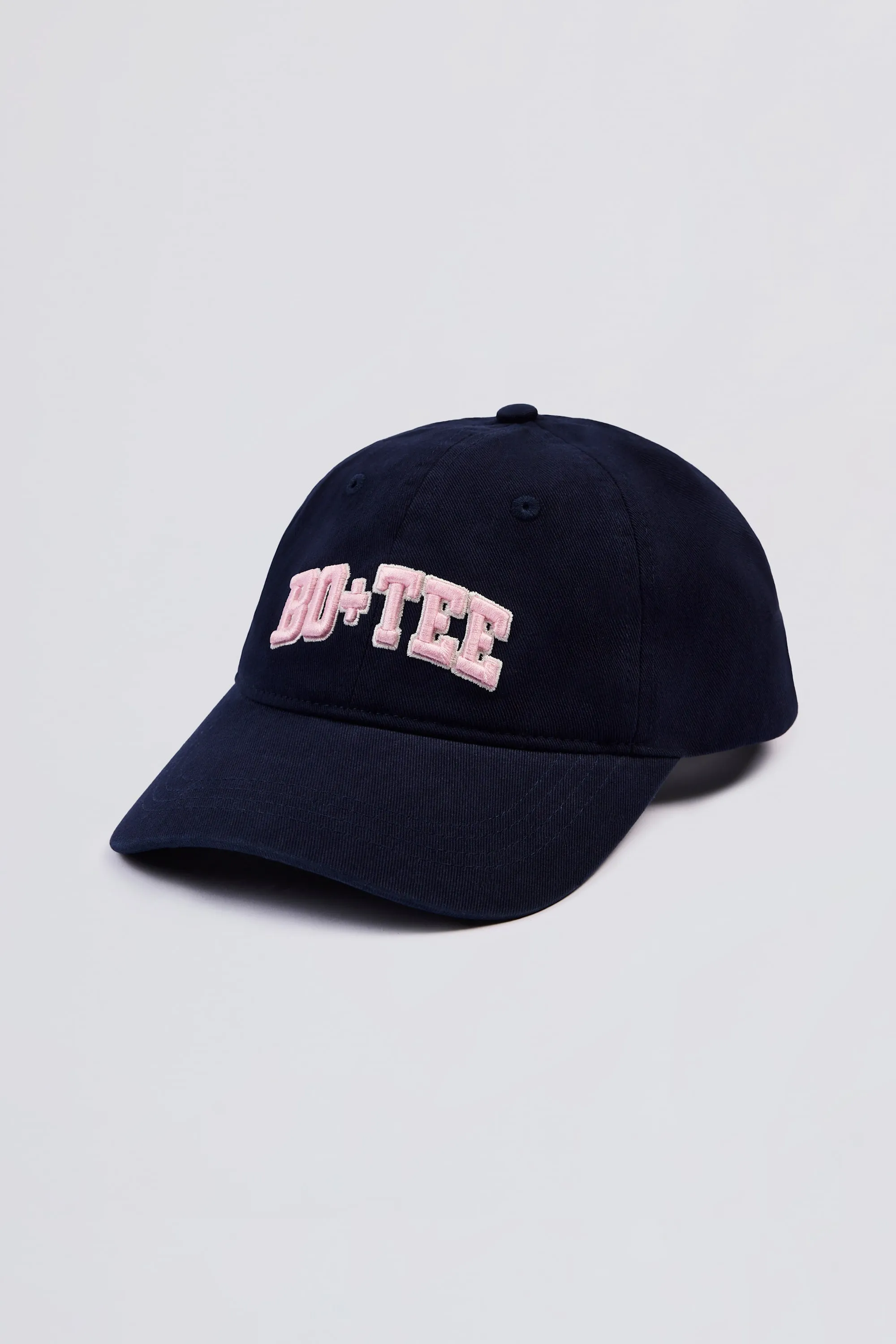 Baseball Cap in Classic Navy sold by Oh Polly
