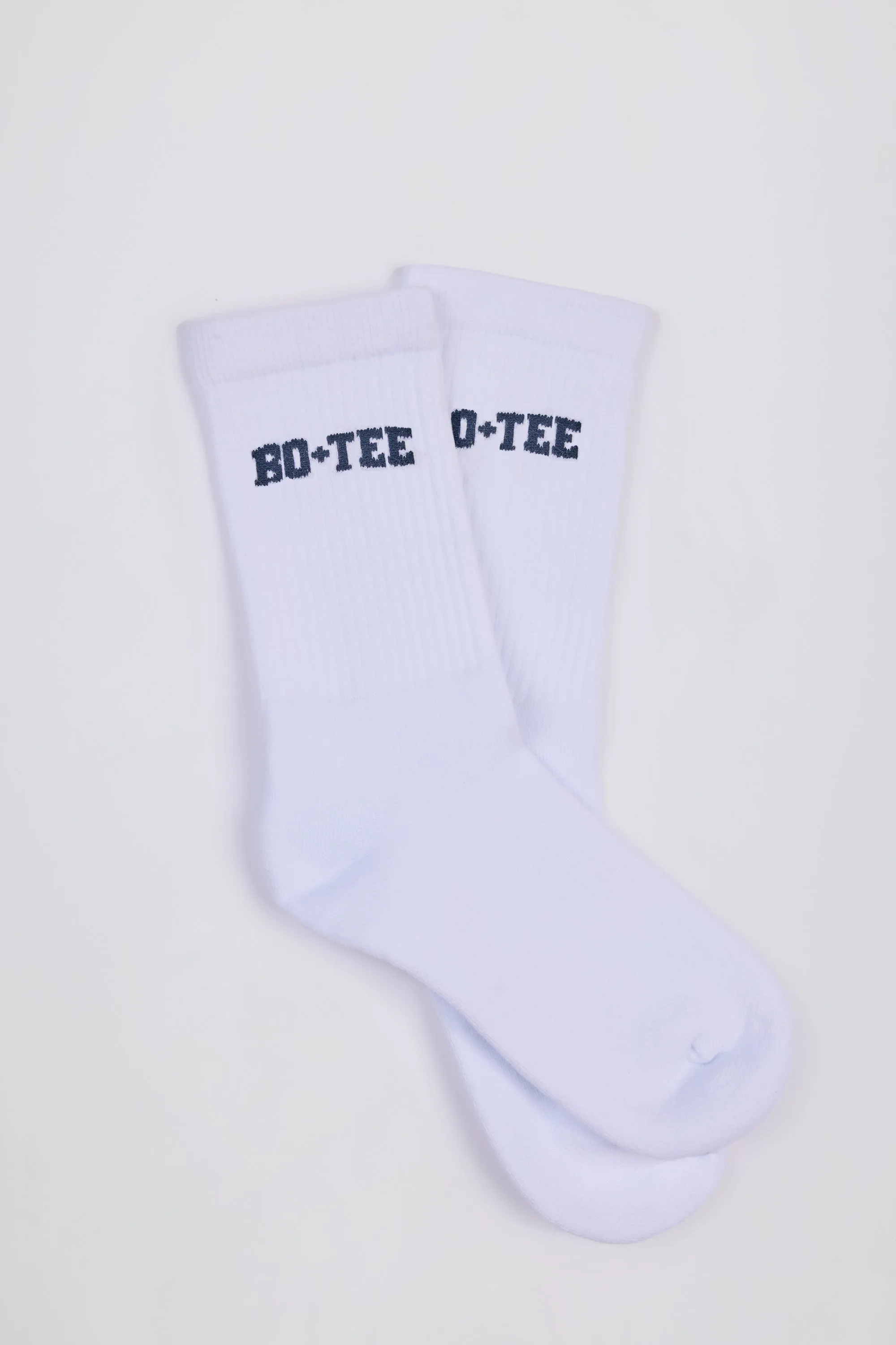 Ribbed Half-Crew Socks in White sold by Oh Polly