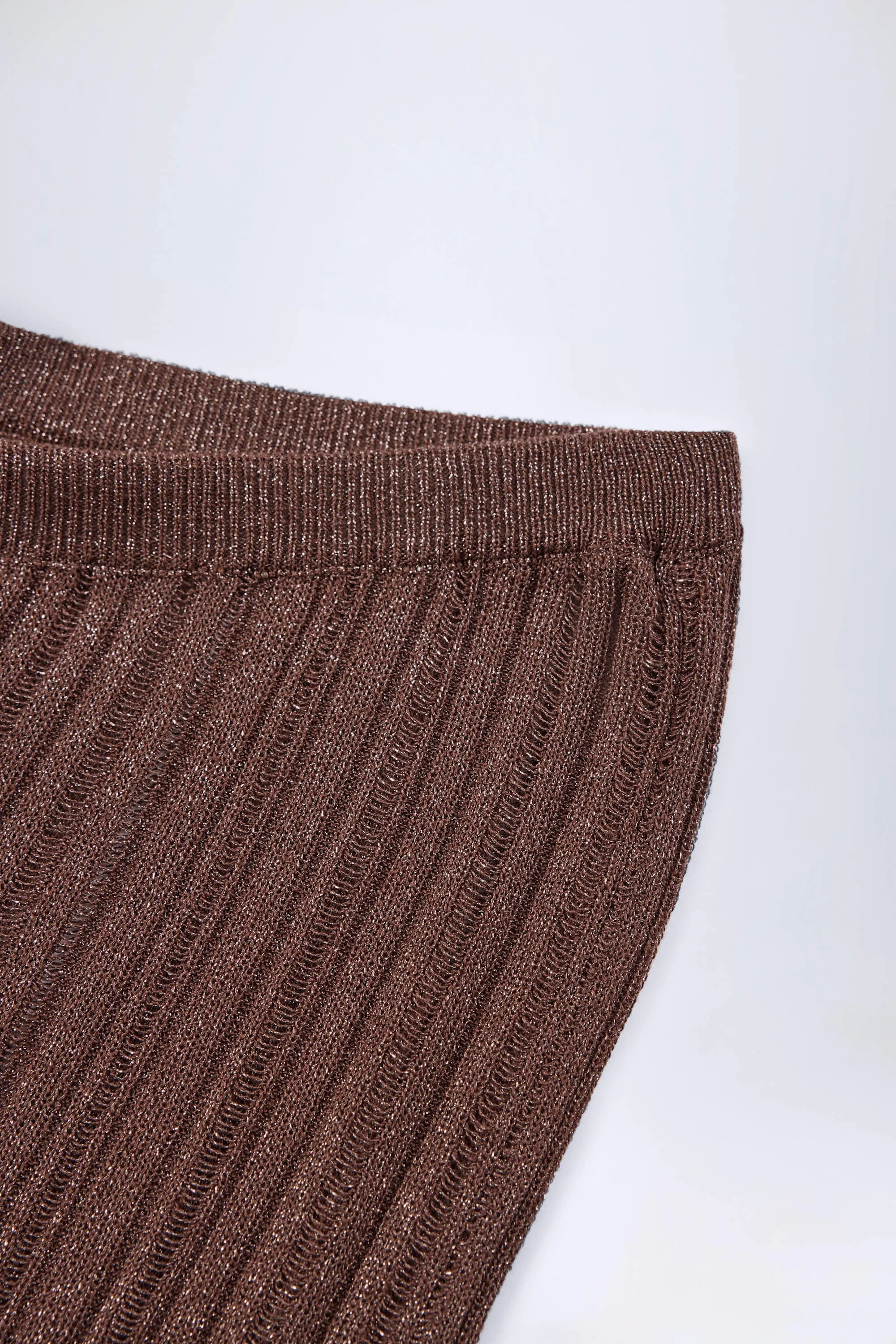 Mid-Rise Flared Trousers in Bronze sold by Oh Polly product image thumbnail 5