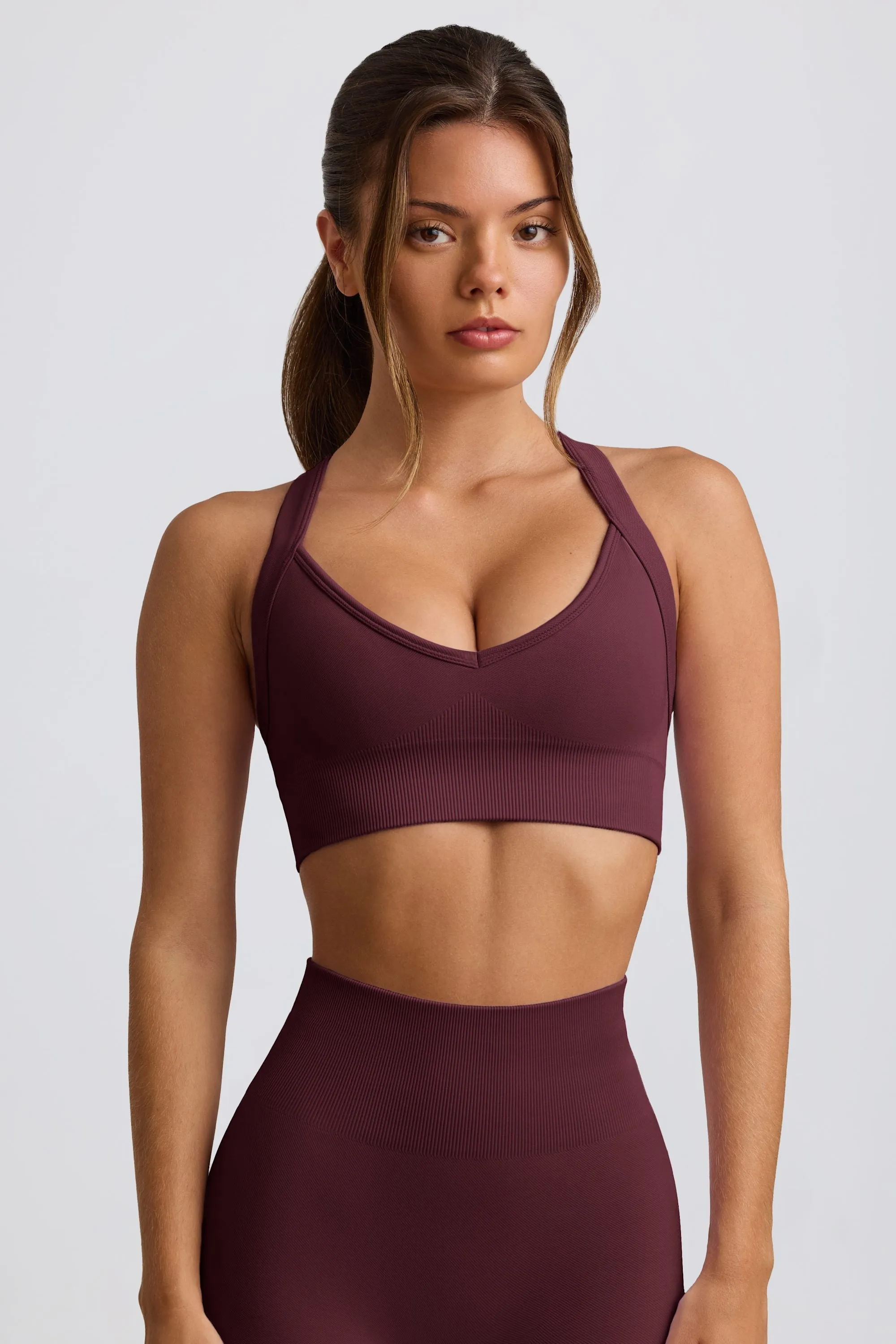 Super Sculpt Seamless Crossback Sports Bra in Burgundy sold by Oh Polly product image thumbnail 2