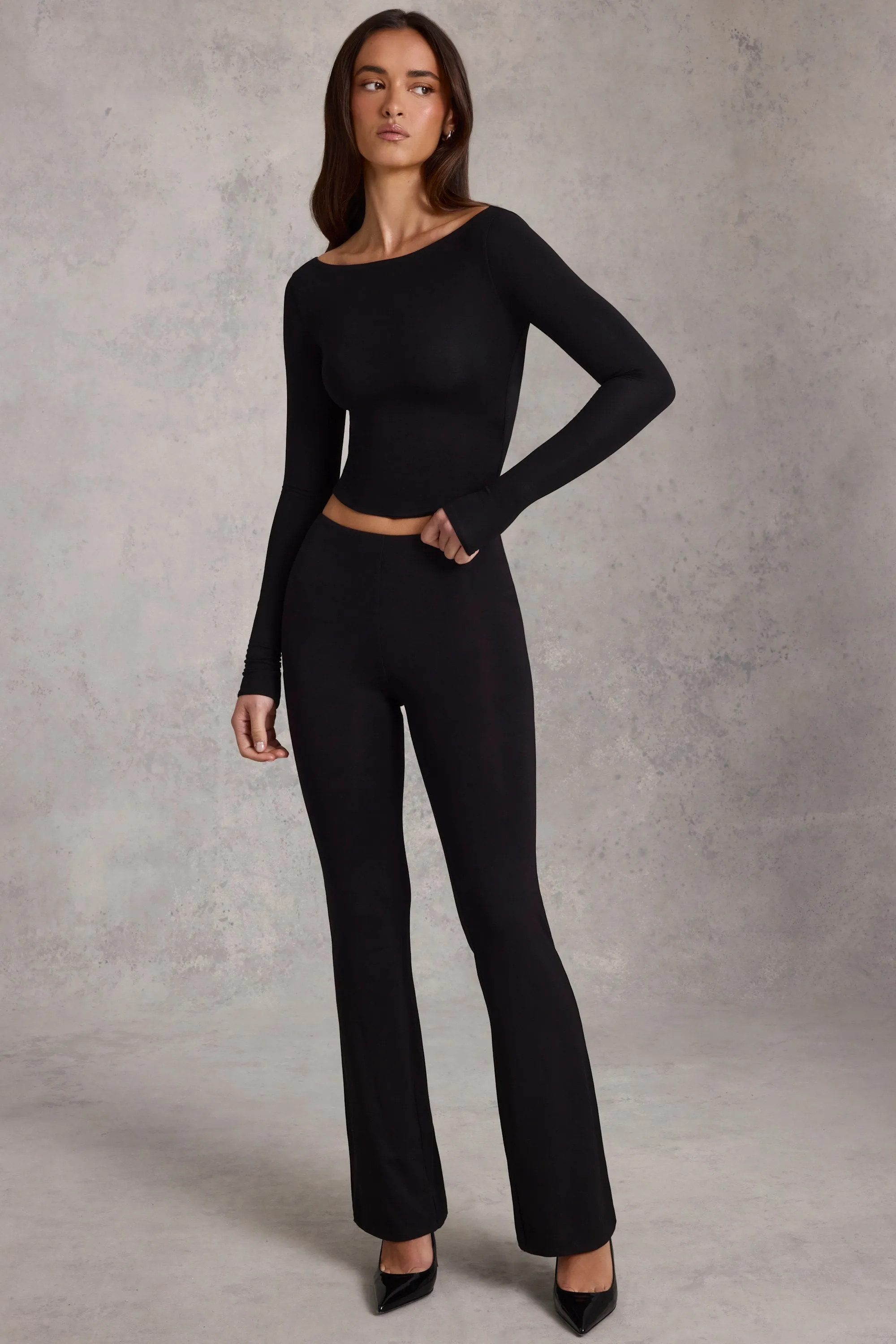Modal Mid-Rise Flared Trousers in Black sold by Oh Polly product image thumbnail 5
