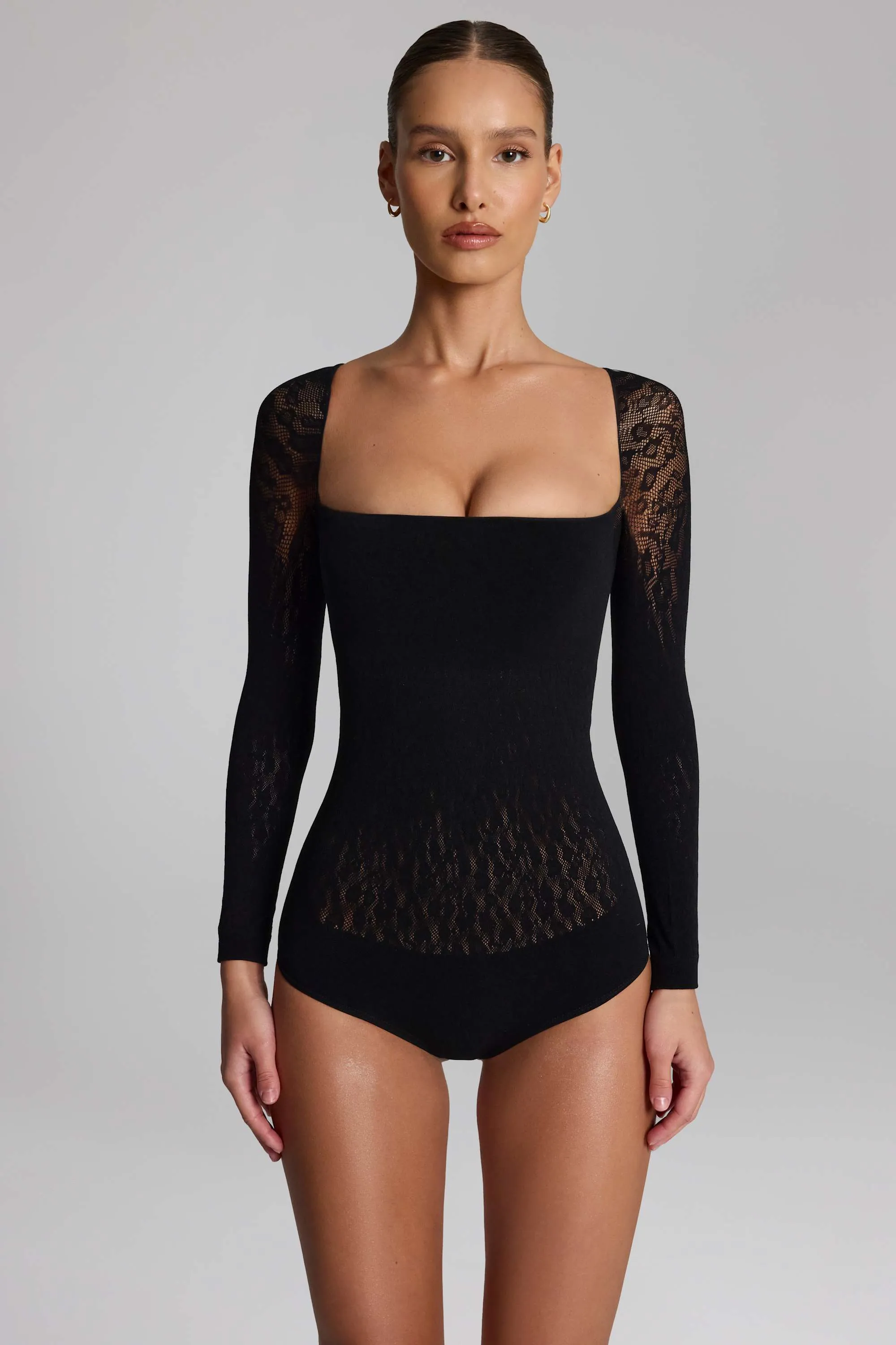 Cap-Sleeve Seamless Knit Bodysuit in Black sold by Oh Polly product image thumbnail 4