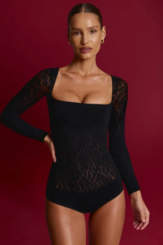 Cap-Sleeve Seamless Knit Bodysuit in Black made by Oh Polly