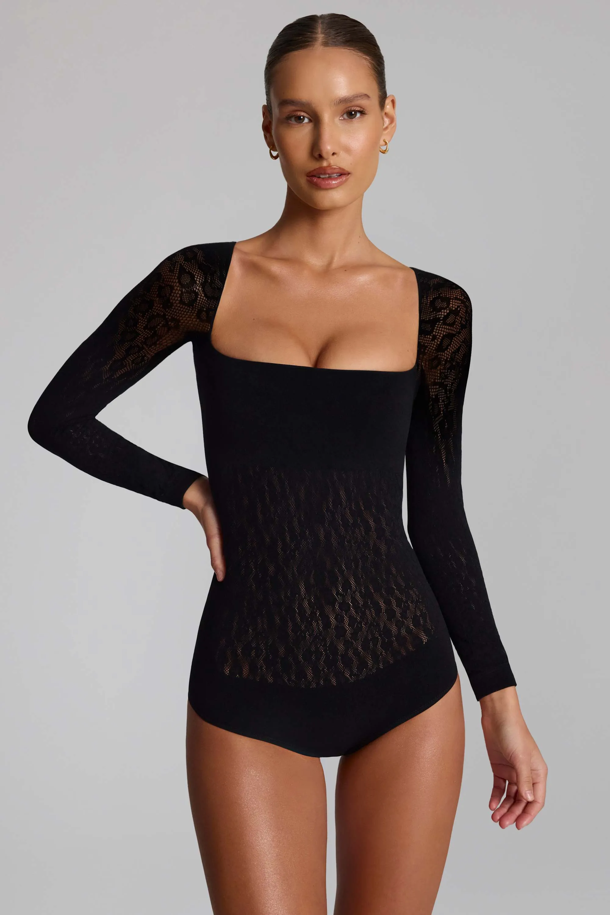 Cap-Sleeve Seamless Knit Bodysuit in Black sold by Oh Polly product image thumbnail 5