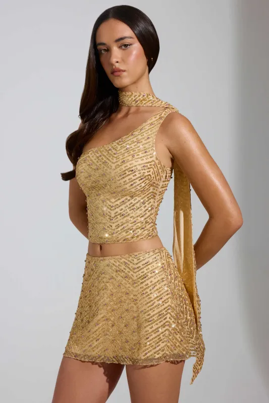 Embellished Asymmetric Scarf-Detail Top in Gold sold by Oh Polly