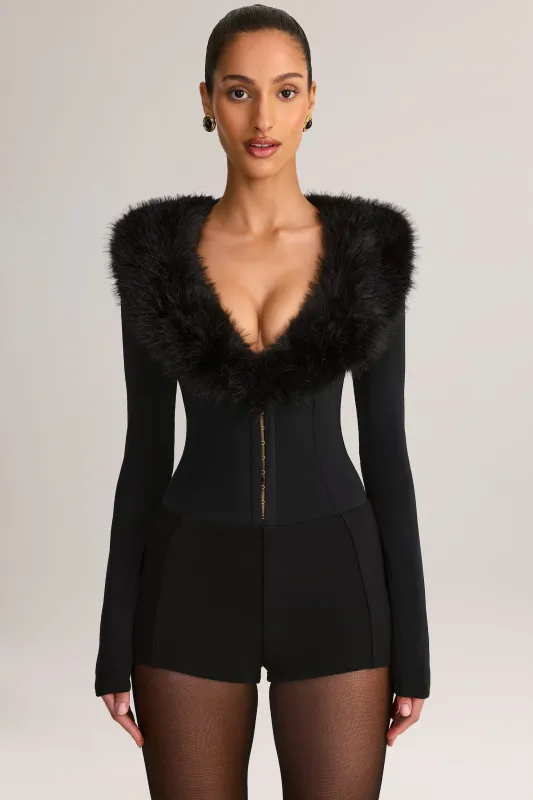 Faux Fur-Trim Corset Playsuit in Black made by Oh Polly