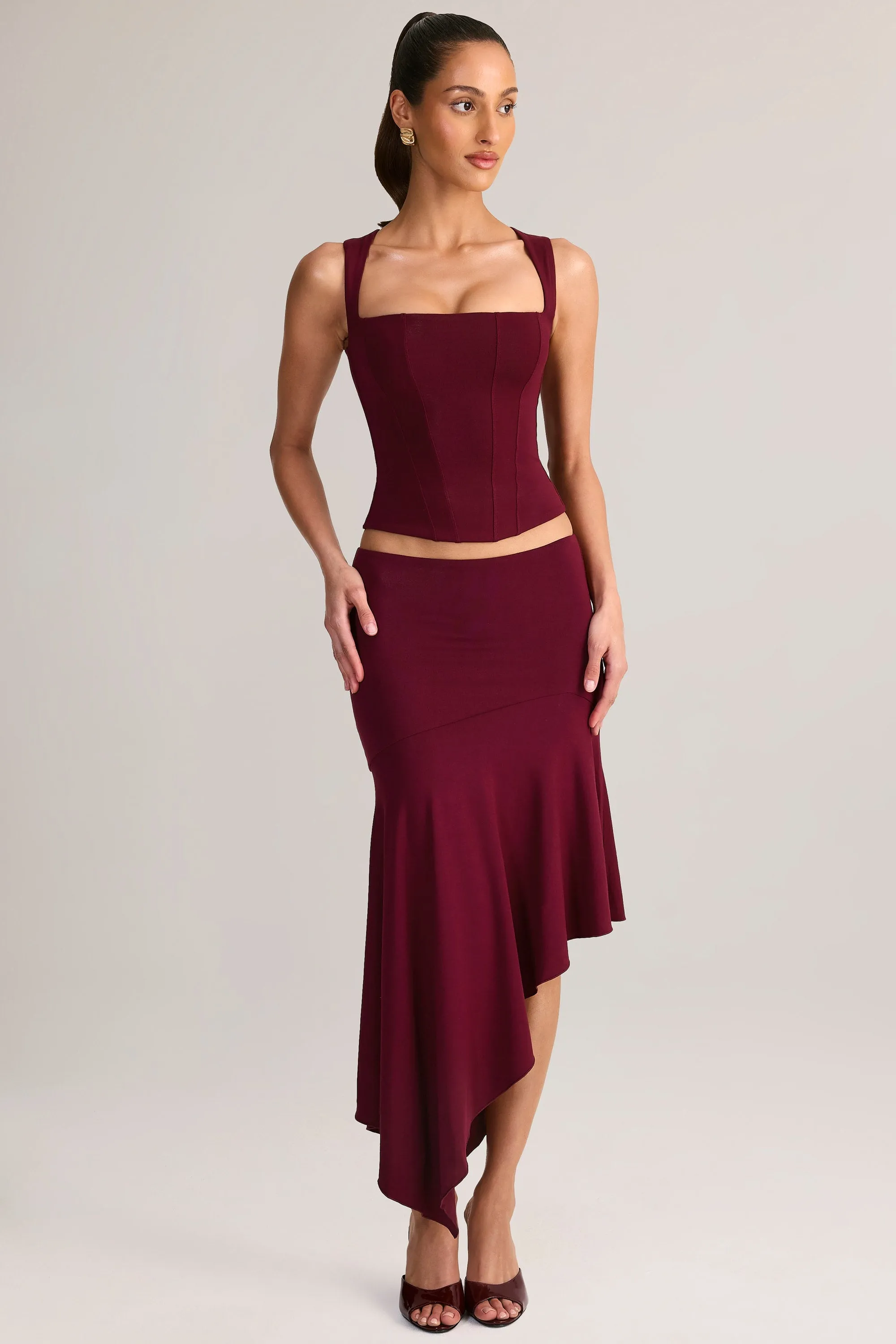 Modal Asymmetric Low-Rise Midaxi Skirt in Wine sold by Oh Polly