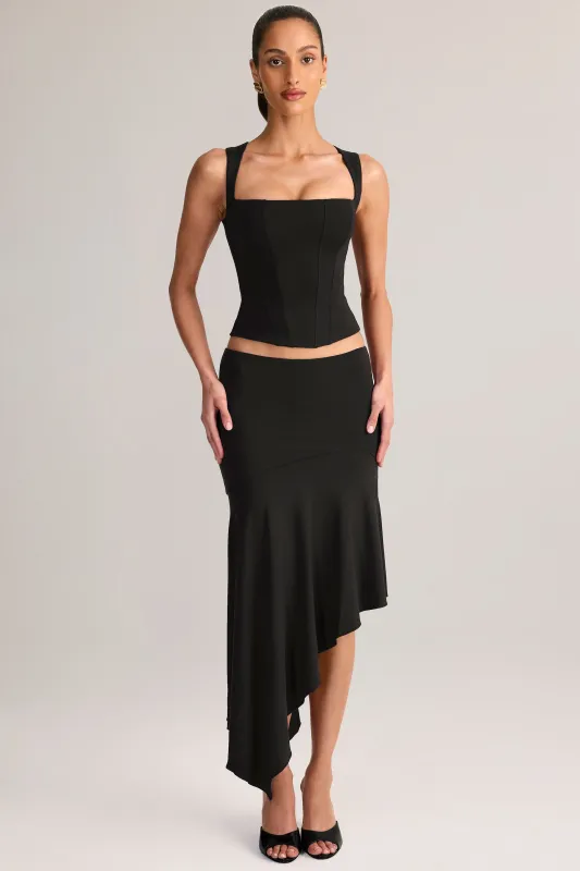 Modal Low-Rise Asymmetric Midaxi Skirt in Black sold by Oh Polly
