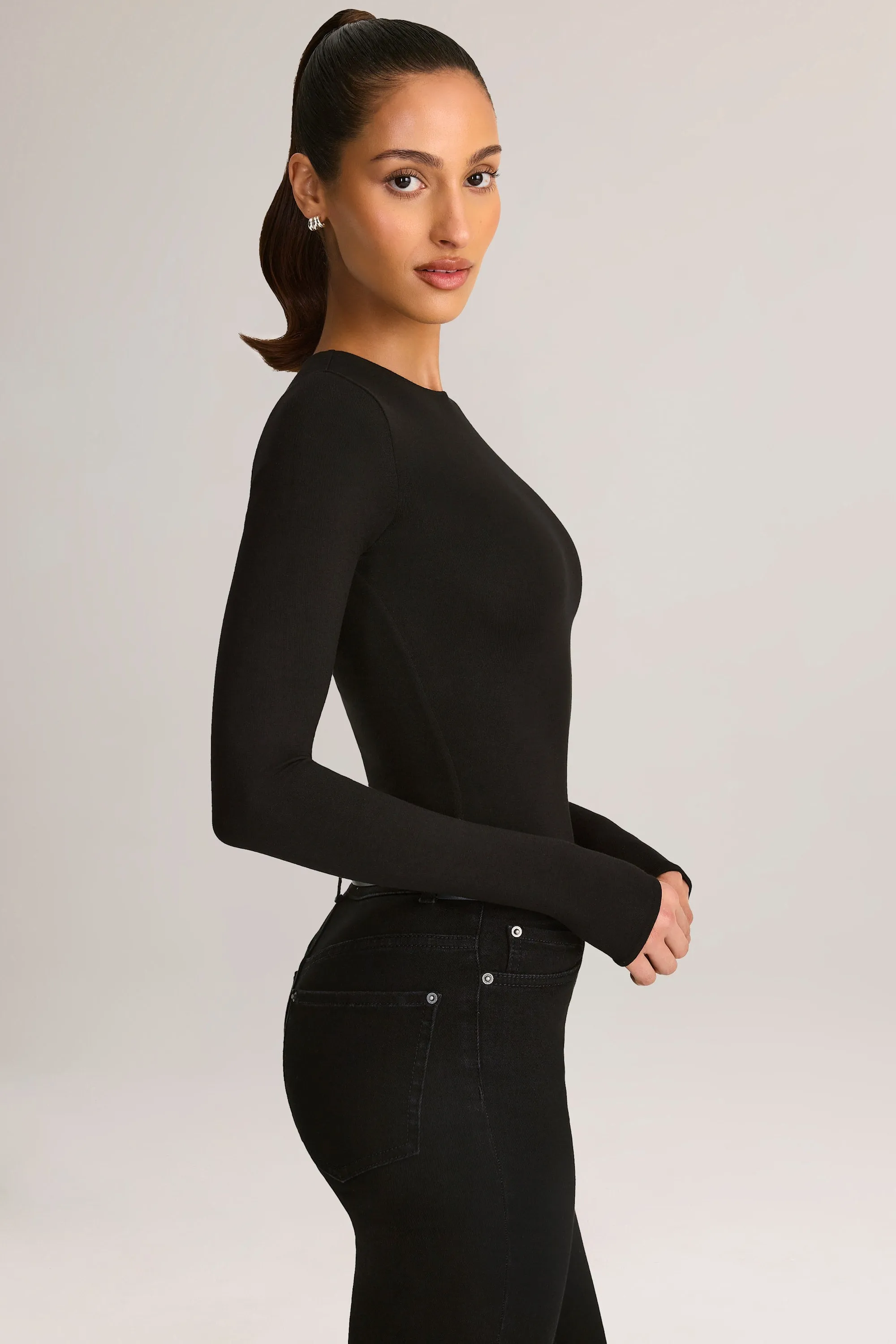 Modal Round-Neck Long-Sleeve Bodysuit in Black sold by Oh Polly product image thumbnail 3