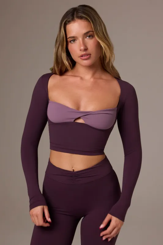 Soft Active Twist-Front Crop Top in Plum sold by Oh Polly