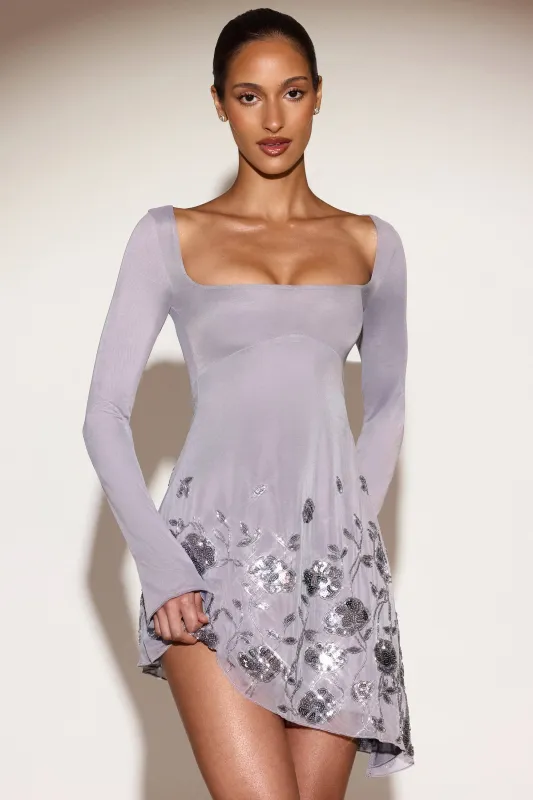 Embellished Asymmetric Mini Dress in Lilac sold by Oh Polly