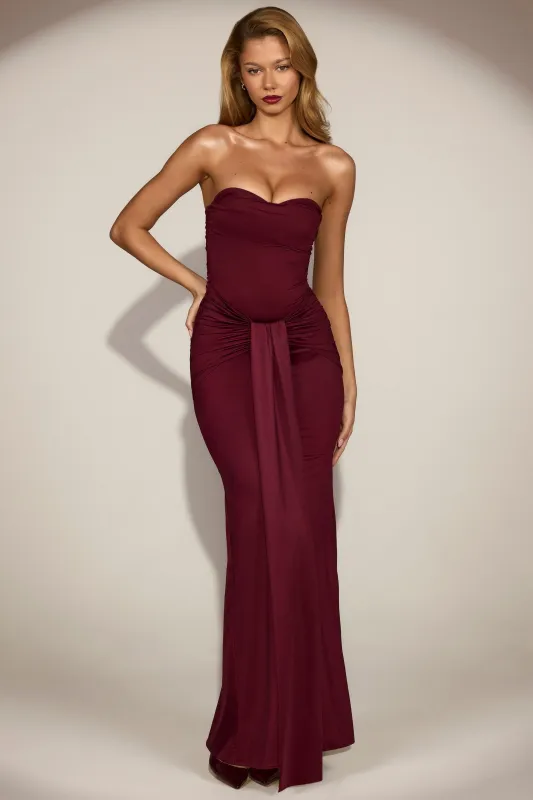Satin Peekaboo Bandeau Draped Gown in Wine Red sold by Oh Polly