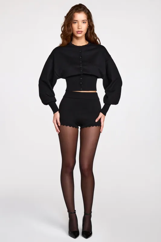 Knit Mid-Rise Mini Shorts in Black made by Oh Polly